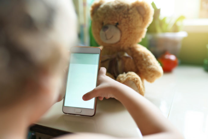 child using phone