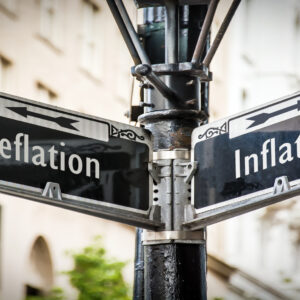 Street Sign the Direction Way to Inflation versus Deflation